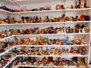 Shelves showing wide range of miniatures available for use.